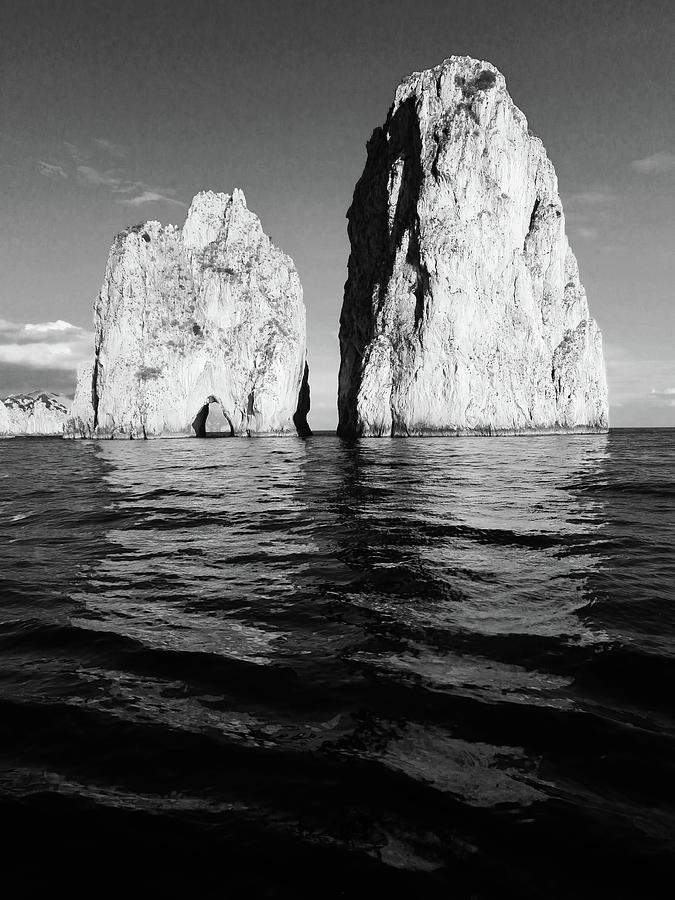 Faraglioni Rocks at Capri Island, Rock Formation in Black and White Photograph by Aneta Soukalova