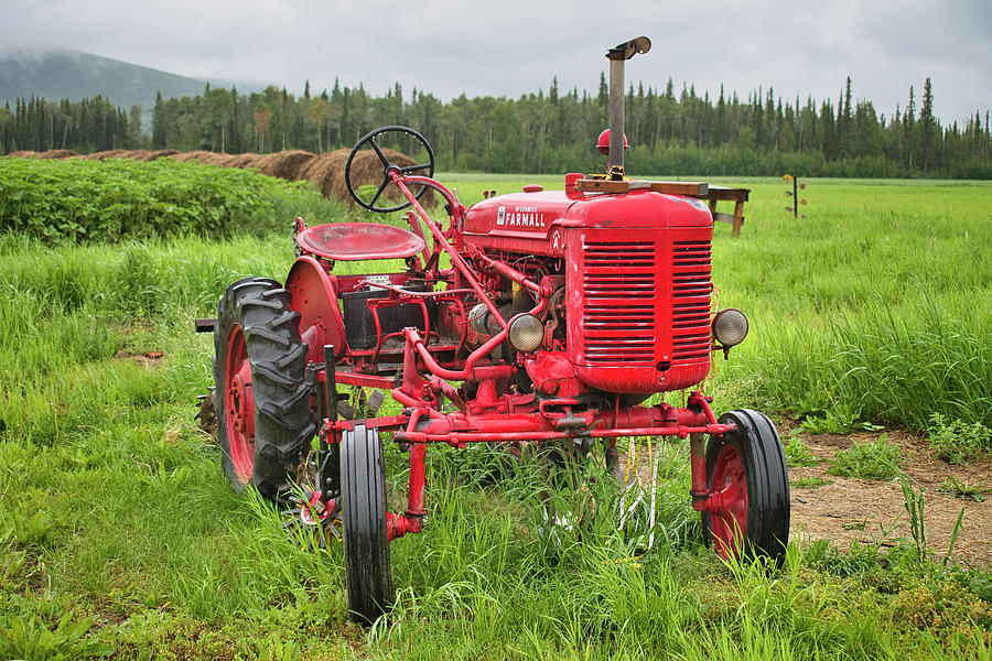 Farmall Tractor In The Rain Photograph
