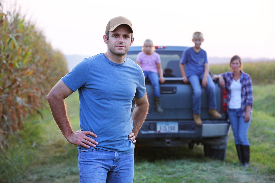 Farmer with his family Photograph by Katrina Wittkamp