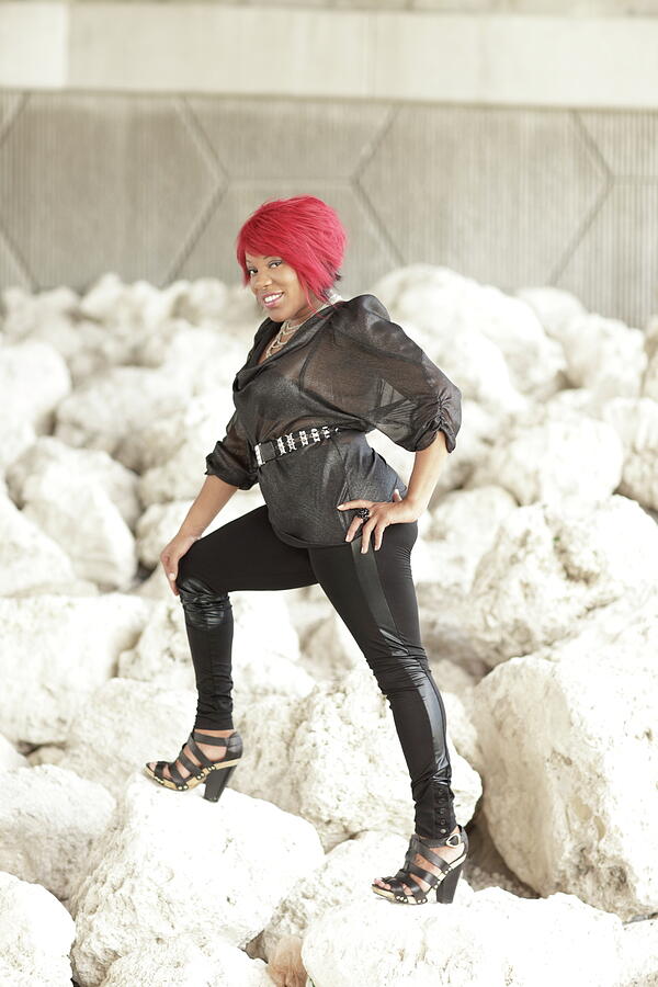 Woman Photograph - Fashion model on a pile of rocks by Felix Mizioznikov