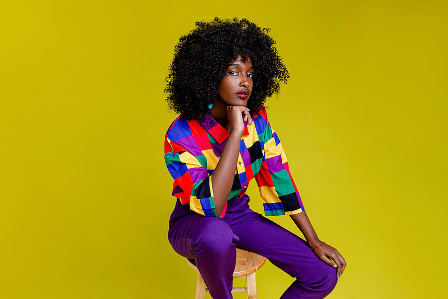 Fashionable woman in colorful shirt Photograph by Phamai Techaphan