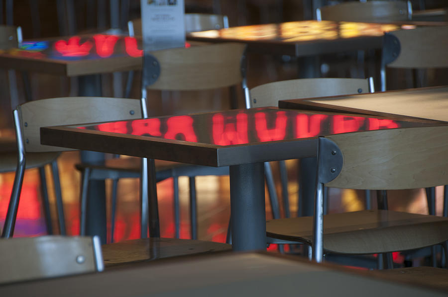 Fast food dining tables and reflections Photograph by Mitch Diamond