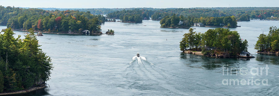 Fast Power boat on ST. Lawrence River in pano format Photograph by Les Palenik