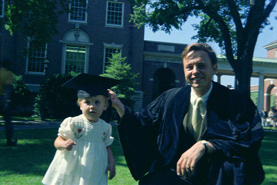 Father and daughter at graduation Photograph by Pnc