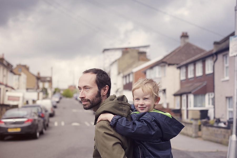 Father and son on school run Photograph by Christopher Hopefitch