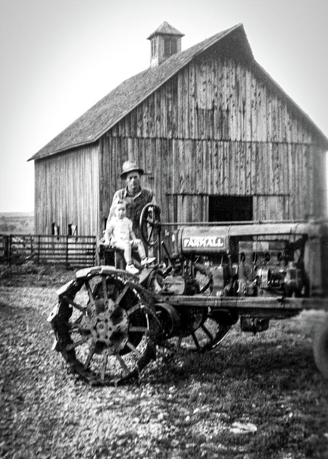 Father Daughter Farmall #1 Photograph by Unknown