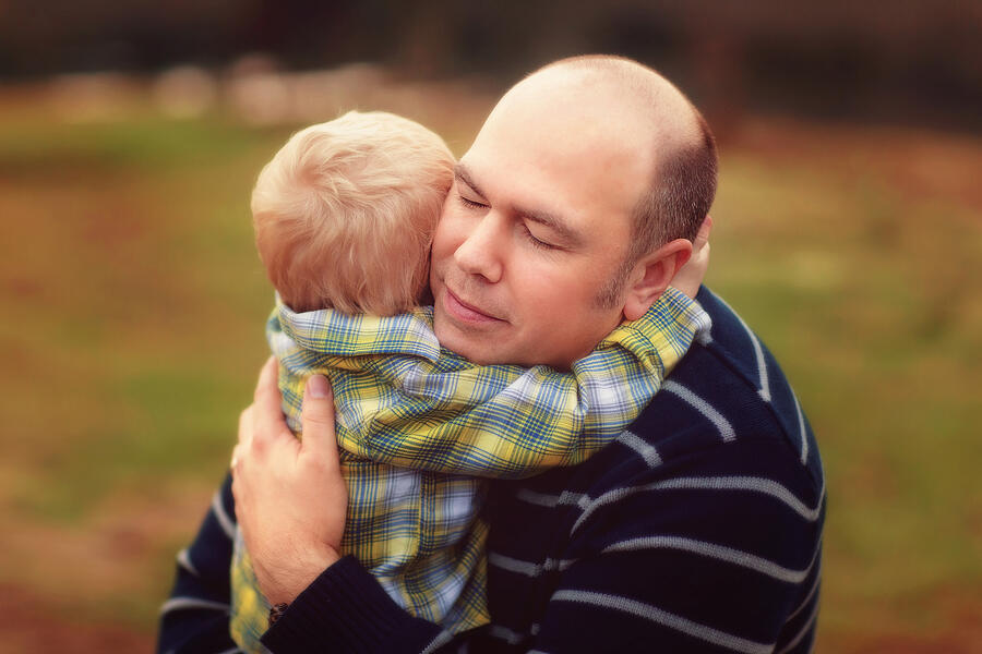 Father Hugging His Two Year Old Son Photograph by Sarahwolfephotography