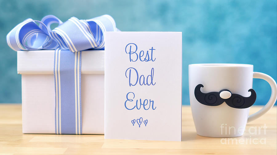 Fathers Day close up of Best Dad Ever greeting card and coffee mug Photograph by Milleflore Images