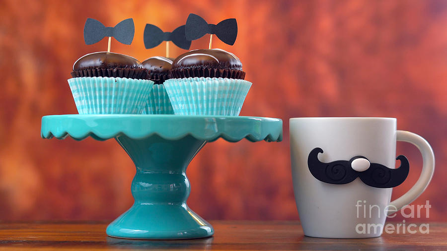 Fathers Day close up of cupcakes and coffee mug against rustic wood background. Photograph by Milleflore Images