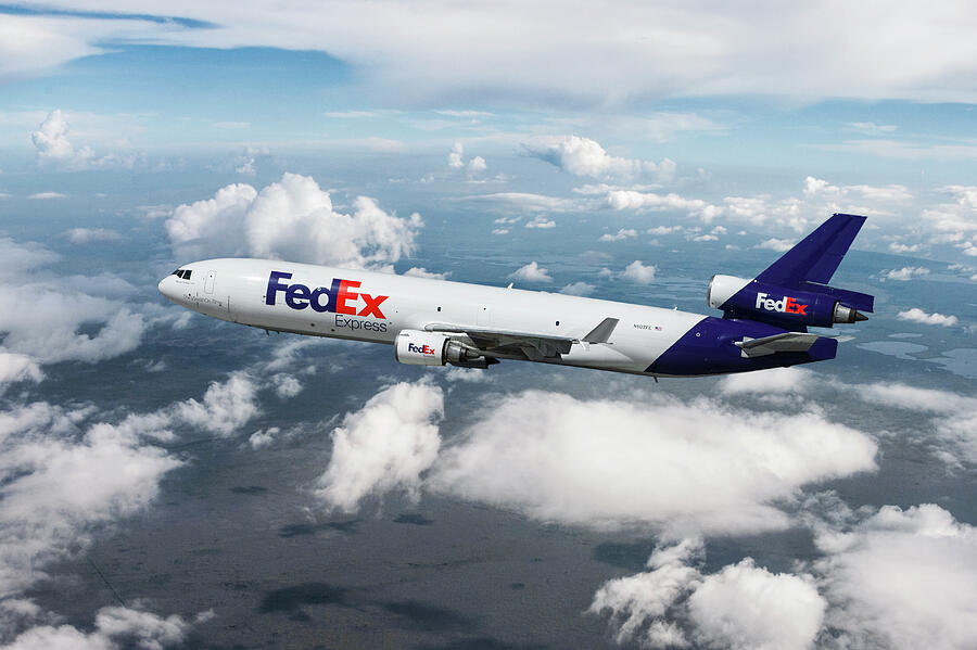FedEx Mcdonnell Douglas MD-11F Mixed Media by Erik Simonsen