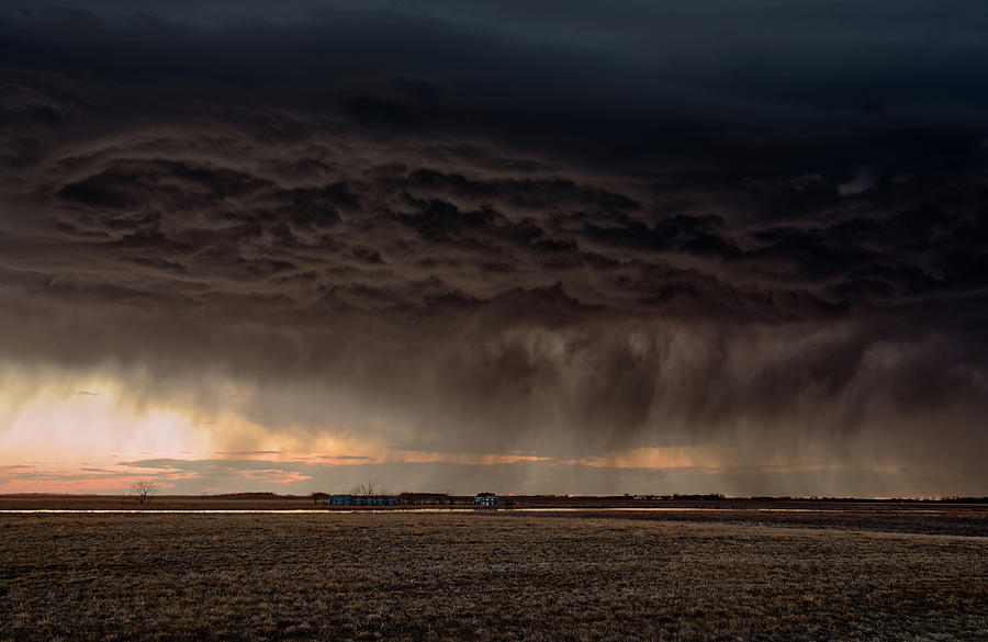 Feelings of Insignificance - storm on ND prairie above an abandoned farm home Photograph by Peter Herman