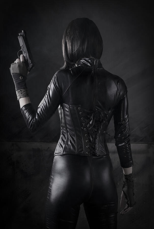 Female Assassin with gun Photograph by Jamie Carroll