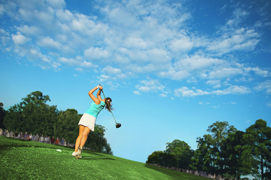 Female Golfer Teeing Off Photograph by Aflo