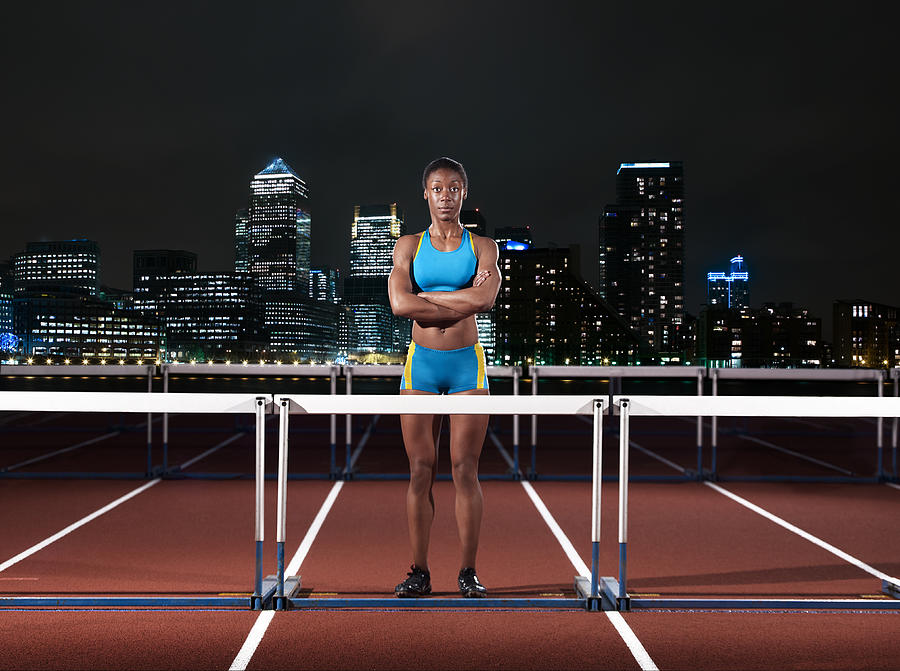 Female Hurdler Standing On Track In London Photograph by Mike Harrington