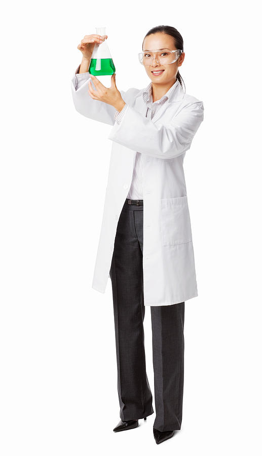 Female Researcher Holding Chemical Solution - Isolated Photograph by Neustockimages