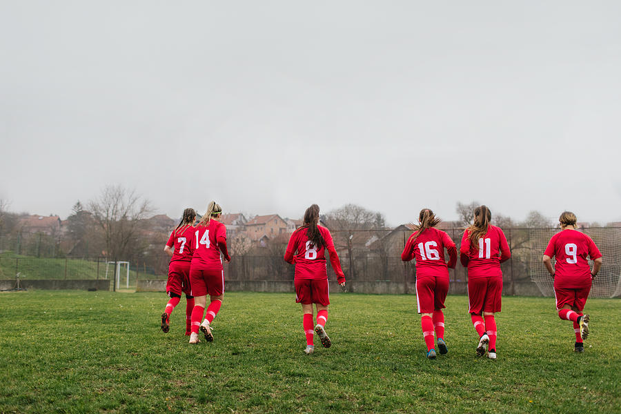 Female Soccer Team Training Photograph by Vgajic