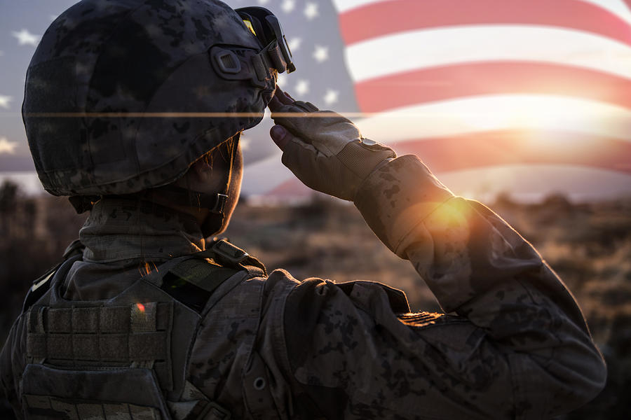Female Solider Saluting US Flag at Sunrise Photograph by Guvendemir