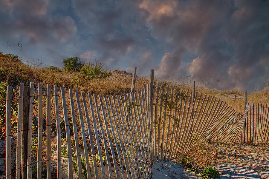 Fence Beside Beach at Dusk Photograph by Darryl Brooks