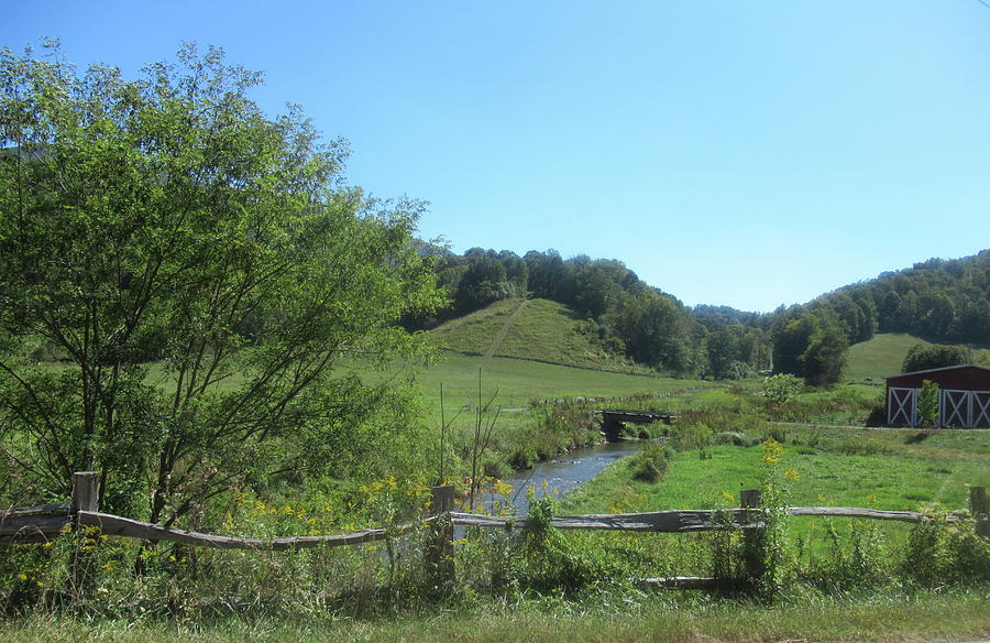 Fence, Stream And Mountains Photograph