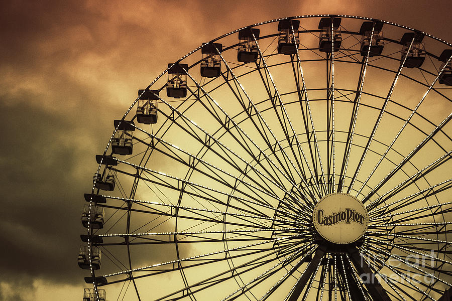 Ferris Wheel on Golden Sky Photograph by Colleen Kammerer