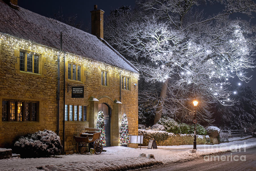 Festive Snowy Broadway Village at Night Photograph by Tim Gainey