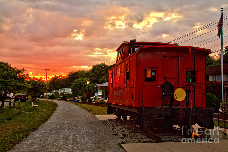Fiery Skies Over The Export PA Caboose Photograph by Adam Jewell