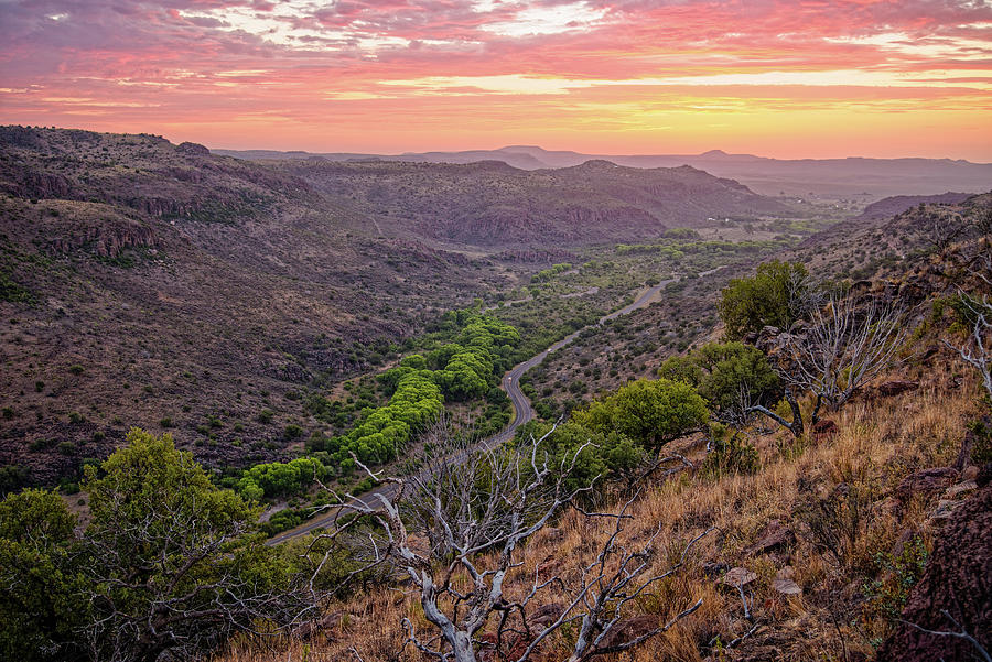 Fiery Sunrise Looking into Limpia Canyon from Davis Mountains State Park - Fort Davis Far West Texas Photograph by Silvio Ligutti