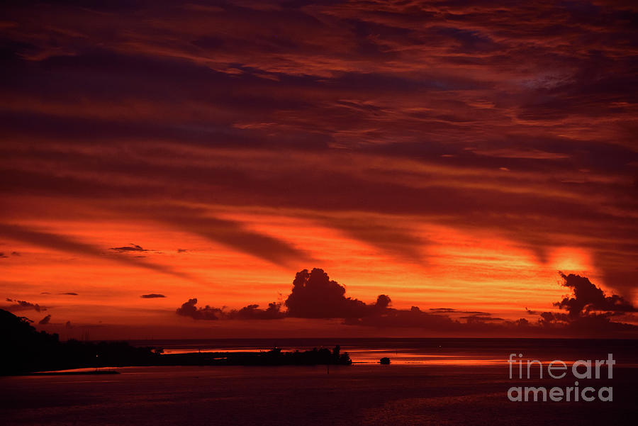 Fiery Sunset, French Polynesia. Photograph by Tom Wurl