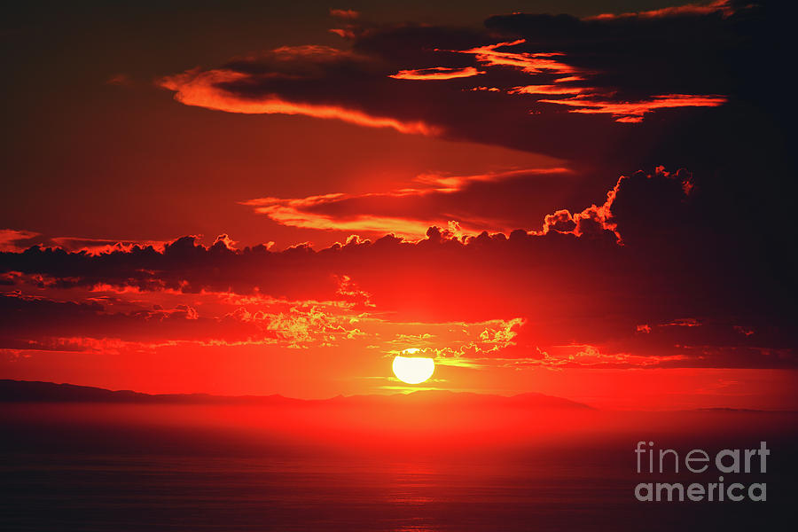 Fiery sunset Piercing the clouds over Catalina Island Photograph by Abigail Diane Photography