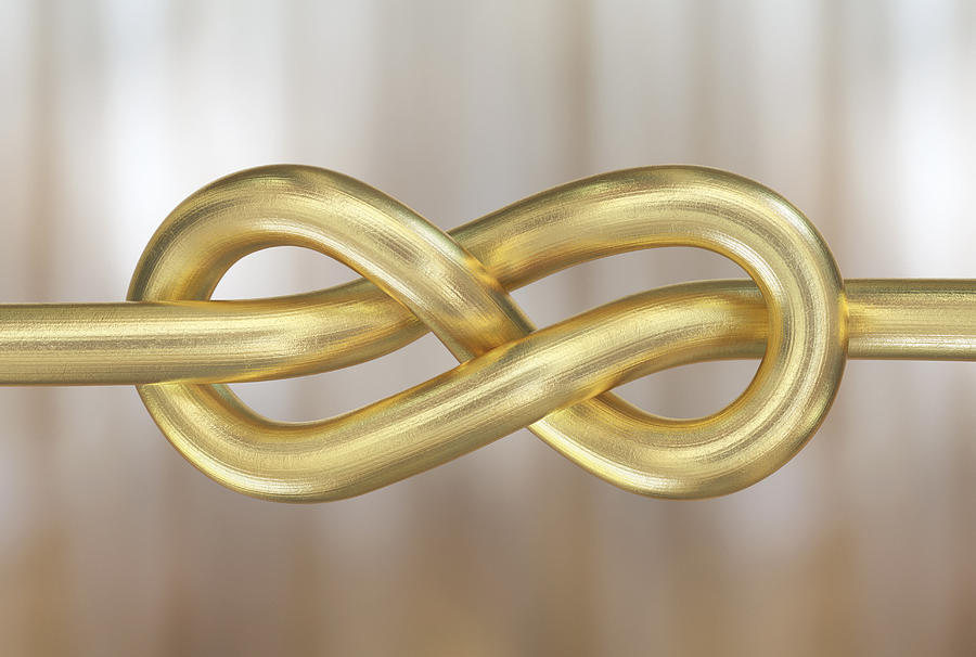 Figure eight knot made from gold cord Photograph by Dimitri Otis