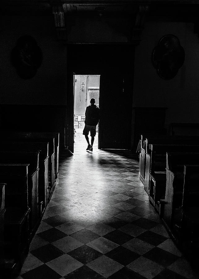 Fine art street photography - Young man at the exit of a church ...