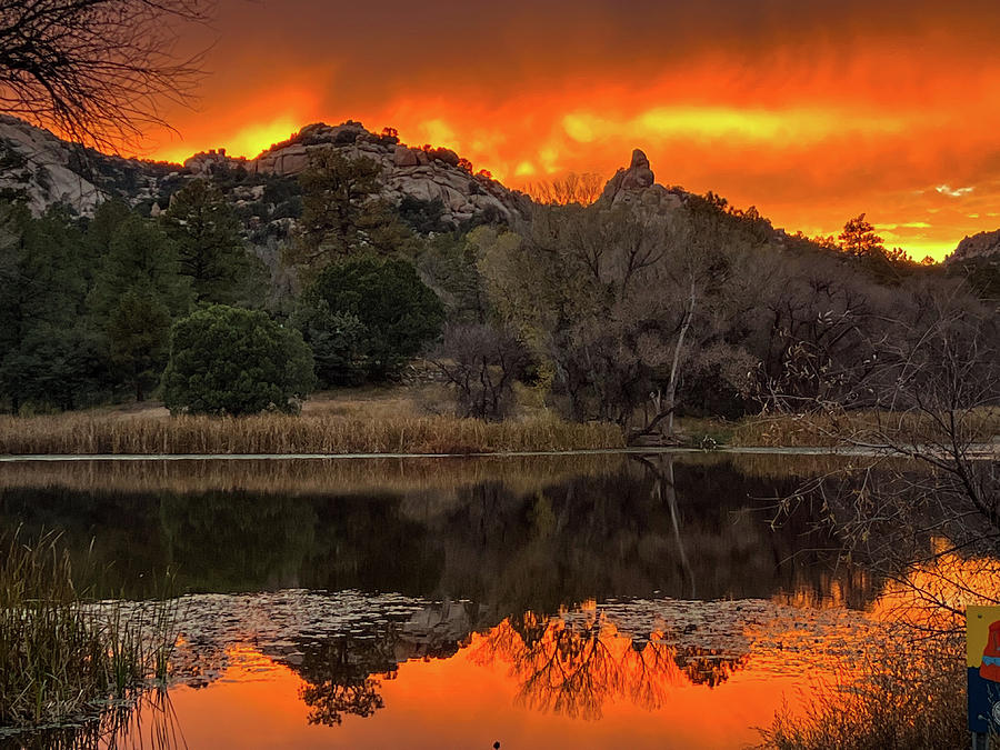 Fire and reflections  Photograph by Rick Reesman