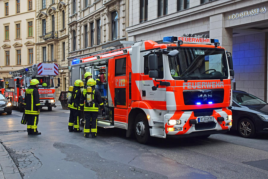 Fire brigades in city center Photograph by Tramino