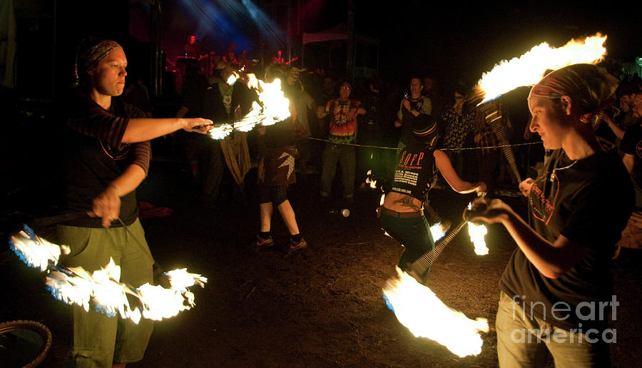 Fire Dancers performing at Mighty High Festival Photograph by David Oppenheimer