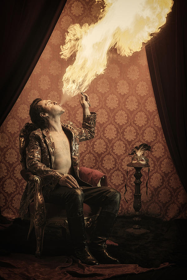Fire eater performance Photograph by Aluxum