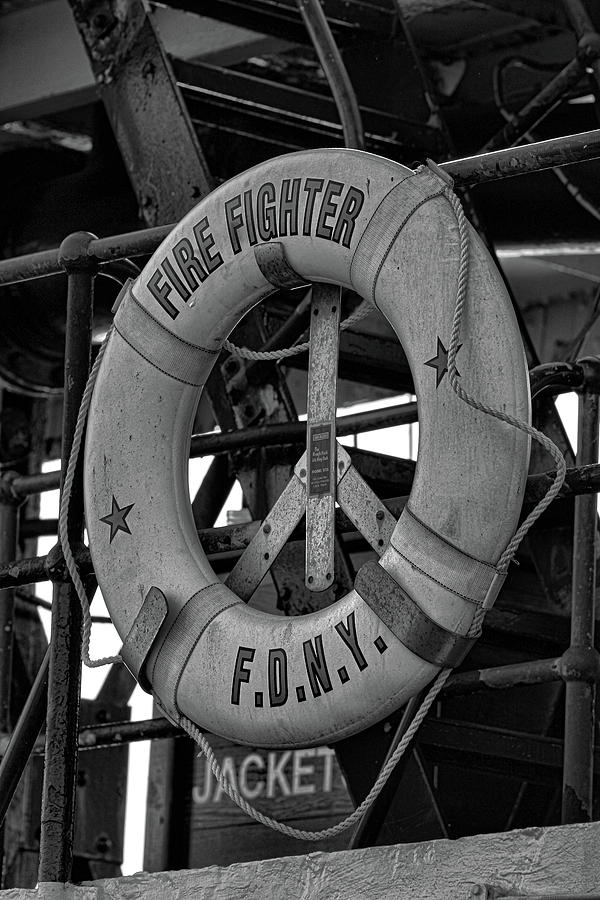 Black And White Photograph - Fire Fighter Life Preserver by Selena Lorraine