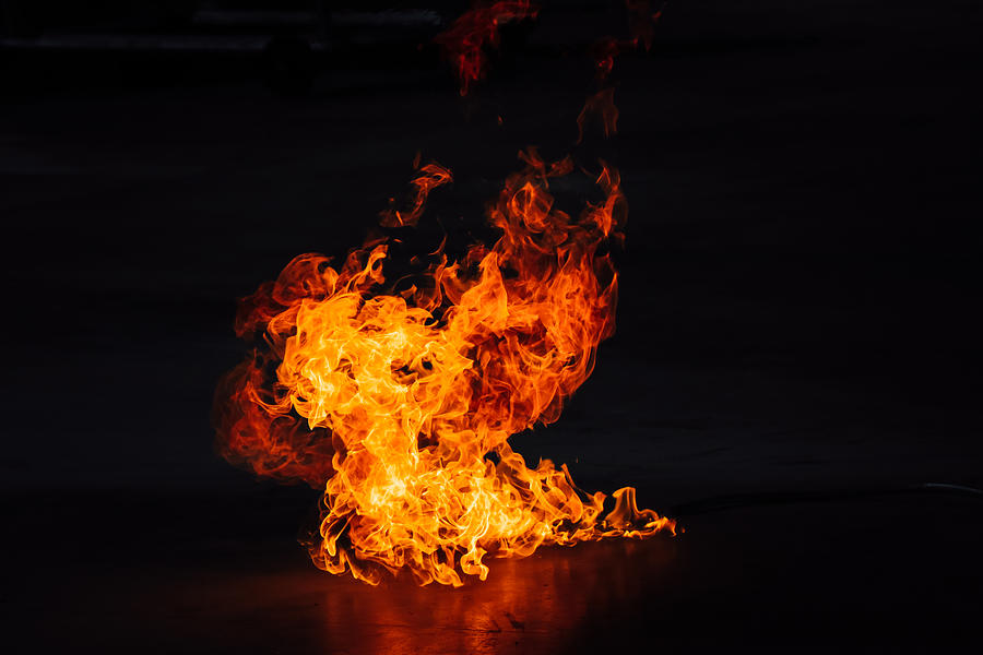 Fire on a black background. Photograph by Mr.wuttisak Promchoo