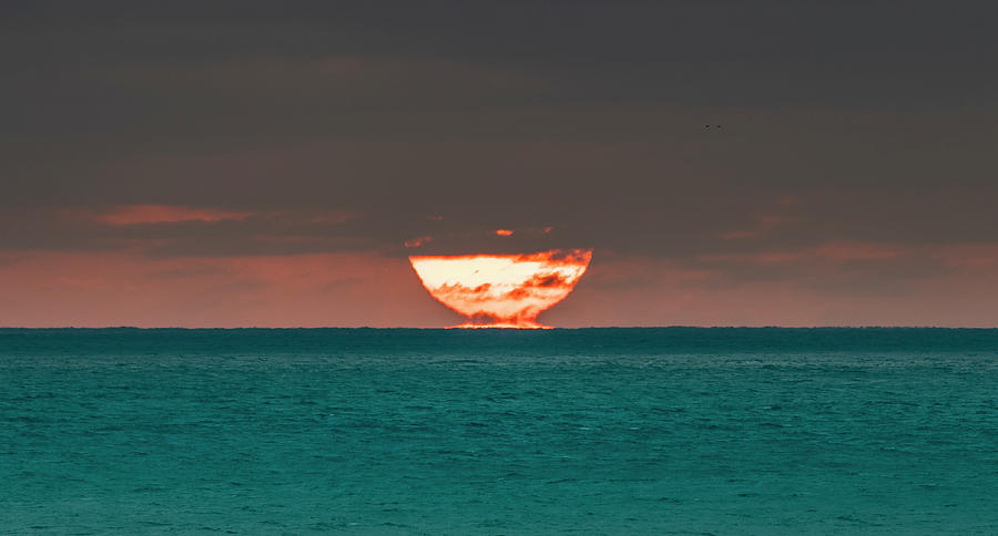 Fire on the Water Photograph by Tommy Farnsworth