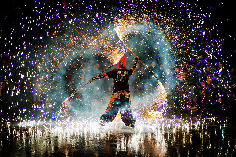Paris Photograph - Fire show performer at night by Philippe Lejeanvre