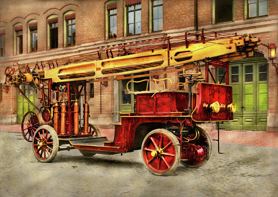 Fire Truck - An electric ladder truck 1907 Photograph by Mike Savad