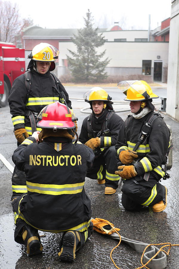 Firemen with instructor Photograph by Valerie Loiseleux