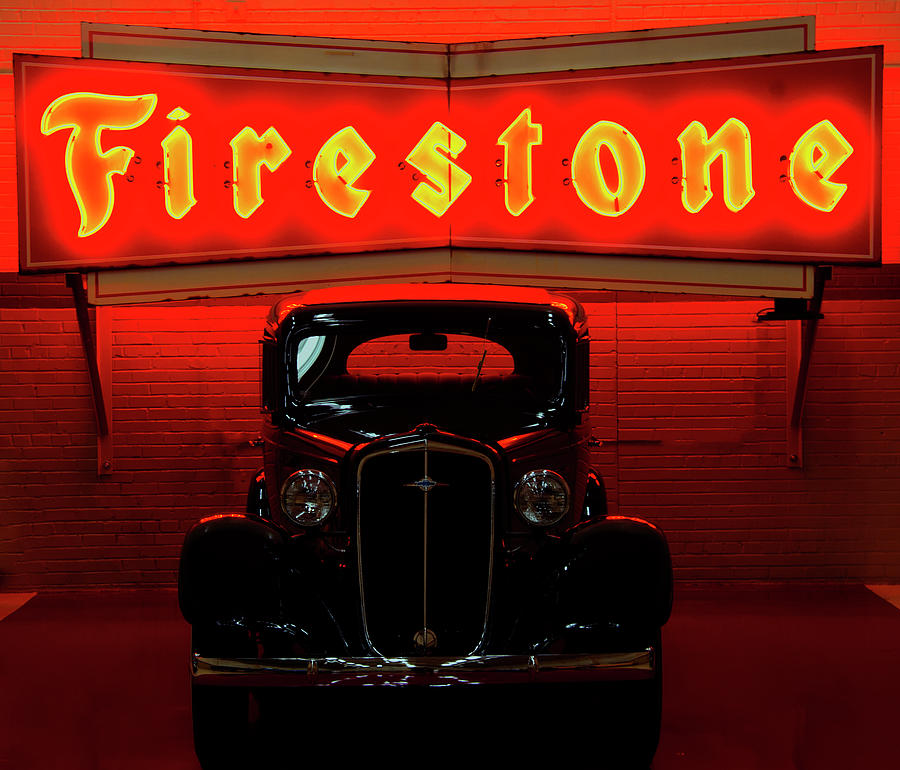 Firestone sign above 35 Chevy Photograph by Flees Photos