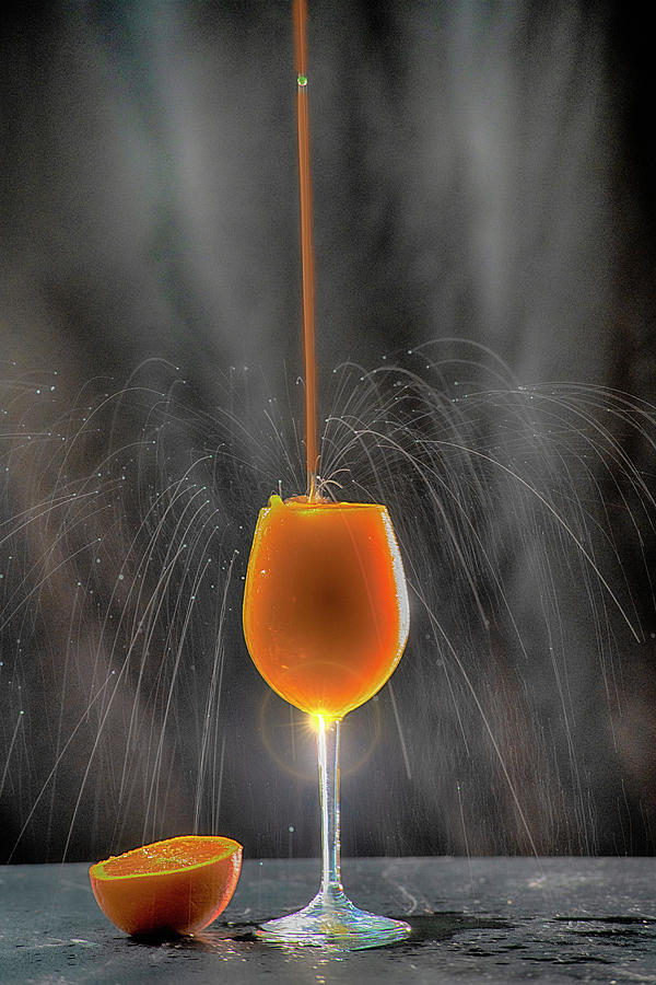 Fireworks explosion orange juice Photograph by Dan Friend