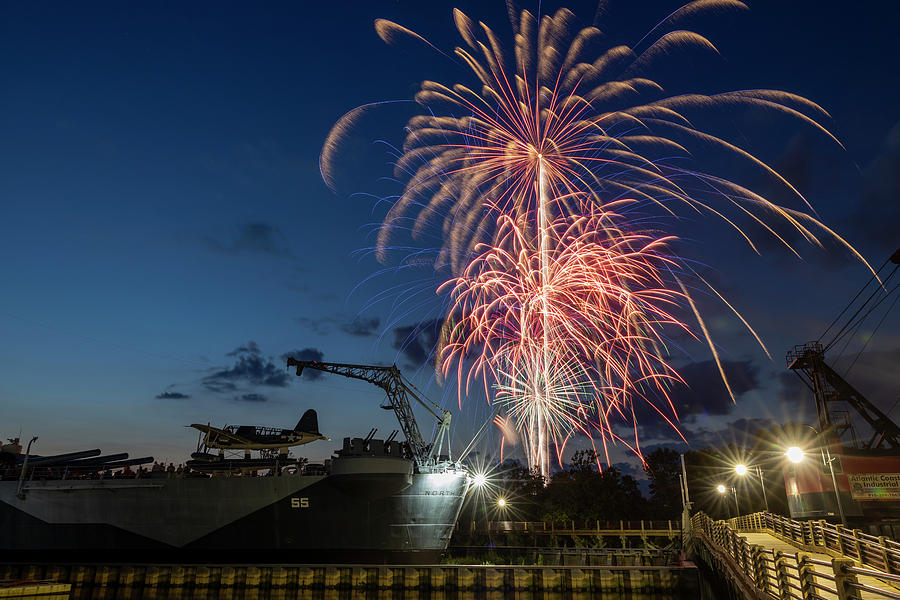 Fireworks next to the USS North Carolina Battleship Photograph by Nathan Rupert
