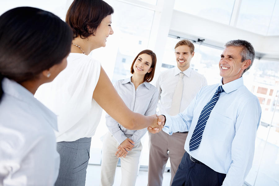 Firm handshake between business associates Photograph by GlobalStock