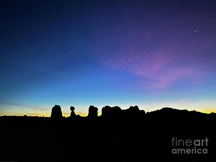 First Light at Arches  Photograph by Laura Honaker