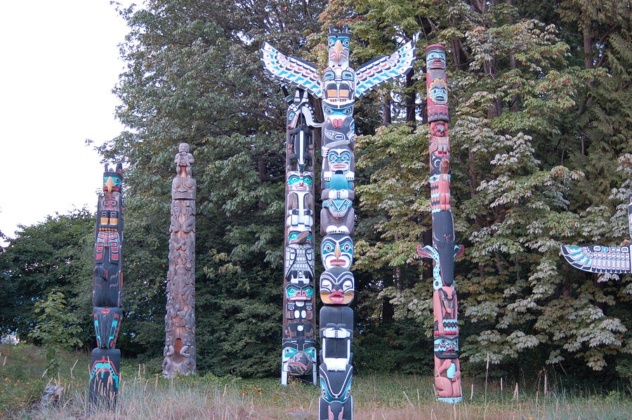 First Nations Totem Poles at Stanley Park Photograph by James Cousineau