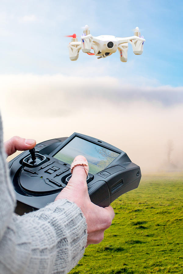 First person view drone flying with remote Photograph by Gregory_DUBUS