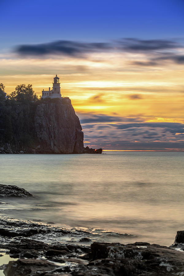 First Sun Rays at Split Rock Lighthouse Photograph by Sebastian Musial