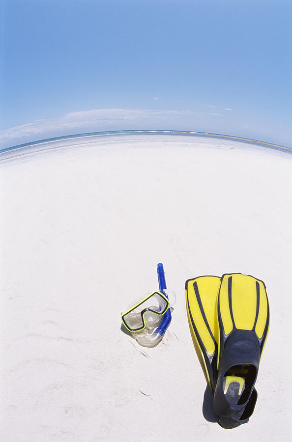 Fish Eye Lens Shot of a Scuba Mask and Swimming Flippers on a Beach Photograph by Darryl Leniuk